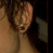 A 3x2 contact sheet of pixelated animated frames showing a person's face and upper body with text overlays, arranged left-to-right top-to-bottom.