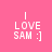 Four identical pixelated text arranged in a , each displaying "I LOVE SAM :]" on solid colored backgrounds