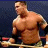Two side-by-side pixelated images of a muscular man in wrestling attire with text labels below each.