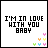 A 4x3 contact sheet of a pixel art animation showing the phrase "I'M IN LOVE WITH YOU BABY" with changing text colors and small heart icons in the bottom-right corner across 12 frames.