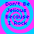 Four identical display blue text on a pink and cyan spiral background with the phrase "Don't Be Jelious Because I Rock"