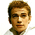 Pixelated static image of a person's head and shoulders with brown hair, light skin tone, and neutral expression against white background.