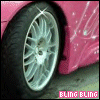 A pink car wheel with silver spokes and black tire, showing a sequence of with a white star-shaped sparkle effect moving across the wheel rim