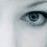 A split-frame image shows a grayscale close-up of a human eye on the left and green pixelated text 'OriginalIcons.com' on a dark background on the right.