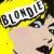 Animated contact sheet of a yellow-haired cartoon character with 'BLONDIE' text, featuring pink heart and smiley face animations across 18 frames.