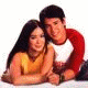 A four- shows a couple in different poses and backgrounds: white, pink, red, and gray