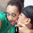 Two people in close proximity with one person's head turned toward the other, visible text "yall!" at bottom, black and white symbols in corners.