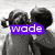 Black-and-white photo of two people kissing, with purple text overlays changing across four