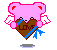 Pixelated pink bear with red inner ears holds brown heart-shaped chocolate bar labeled LOVE, blue ribbon, and white wings against gray background.