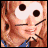 Pixelated cartoon character with blonde hair and blue top in a 2x2 contact sheet showing three animation frames of eye changes.