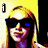 Pixelated image of a person with long blonde hair wearing dark sunglasses and a purple top against a yellow background, next to a gray oval shape with 'ROCK!' text.
