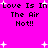Bright pink background with black pixelated text repeating 'Love Is In The Air Not!!' and scattered white plus signs in a static layout.