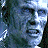 Pixelated image of a pale, distressed face with visible teeth and blue-toned text reading 'UNDERWORLD' in two sections.