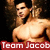 Shirtless male figure with dark hair in three , red text overlay reading 'Team Jacob' in left , dark background with blurred figures behind