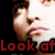 A pixelated image of a person's face with red text reading "Look afheart -" and "it with y" overlaid on black and gray backgrounds.