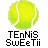 Pixelated tennis ball icon with text elements on gray background, static image.