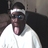 Static 48x48 pixel icon showing a person with dark hair wearing a white headband and white shirt, sticking out their tongue in a playful expression against a blurred background.