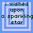 Four identical pixelated display text 'i wished upon a sparkling star' with blue and white square borders, each showing the same static composition