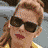 A 4-frame contact sheet of a pixelated animated icon featuring a woman with brown hair in various poses and expressions, including one frame with sunglasses and red lipstick, alongside the text "Coolbuddy.com" on a white background.