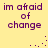 Yellow background with purple text reading "im afraid of change" in four identical quadrants, each with a small cluster of purple dots in the lower-right corner.