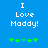 Blue background with white pixelated text "I Love Maddy!" and green pixelated plus signs below, showing animation where the middle plus sign changes color.