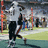 A pixelated image of a football player in motion on the left, with blue background text reading "L.T. Is A BEAST".