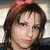 A pixelated image of a person with brown hair and a pink headband, next to the text 'lolita' in bright pink letters on black background.