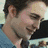 A split-screen image with a person in blue on the top left, red text reading 'edward cullen prefers brunettes' on black background right, and two people embracing below with '<3' symbol.