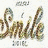 A static image shows a yellow smiley face icon with black eyes and mouth on the right, next to stylized brown text reading 'Smile' on the left.