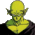 Pixelated yellow-skinned cartoon character with pointed ears, green neck collar, and dark clothing against a gray background.