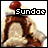 Pixelated ice cream sundae with whipped cream, chocolate syrup, and a cherry on top; text "Sundae" appears above the dessert in blocky font.