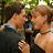 A pixelated contact sheet showing two frames of an animated buddy icon with a couple kissing on the left and text "I love evenwood" on the right.
