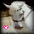 Animated buddy icon featuring a white cartoon bull with horns and a chain collar, showing two frame variations of its expression and a pink heart symbol.
