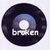 Two circular black vinyl record icons with blue center rings and white labels, displaying text changes from 'broken' to 'record'.