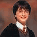 four and four shows a young man with dark hair, glasses, and a black robe over a white shirt and brown tie. The text "Harry Potter" appears in orange across the image