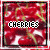 A 2x2 contact sheet of four animated frames showing red cherries with the word "CHERRIES" in pixelated text, each frame having a different border style.