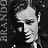 Pixelated grayscale portrait of a person with short hair, side profile facing left, mouth slightly open in neutral expression.
