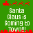 Green background with red pixelated reindeer and sleigh icons above and below white text reading "Santa Claus is Going to Town!!!" in two identical vertical sections.