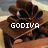 Pixelated image of a brown horse with a rider in a desert landscape, overlaid with white pixelated text reading 'GODIVA'.
