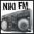 Two side-by-side frames of a pixelated grayscale buddy icon showing "NIKI FM" text above a boombox-like speaker design with visible dithering and anti-aliasing artifacts.