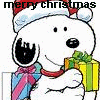 White cartoon dog wearing red Santa hat and red collar, holding two wrapped gifts with green and pink ribbons, smiling with text 'merry christmas' above.