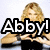 A woman with long blonde hair forms a heart shape with her hands, with text overlay in the first frame.
