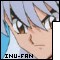 Pixelated anime-style character face with light blue hair and brown eyes, wearing a white top against a solid blue background.