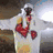 Animated icon shows a person in white with red heart symbols on chest, transitioning to a person in red shirt with yellow collar against dark background.