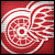 A static pixelated image with a red background and white swirling patterns forming concentric circular shapes.