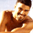 Static 48x48 pixel icon of a shirtless man with dark hair and facial stubble holding a brown object against a light background, rendered in low-resolution pixel art style.