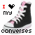 nine pixelated images showing black high-top sneakers with white laces and pink accents, each paired with text variations reading "I ❤️ my converses" in different colors