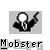 Pixelated figure in dark suit with white shirt and tie points right, holding a large circular object above head against gray background.