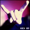 A hand making a rock-on gesture with fingers extended against a purple and blue gradient background, with 'ROCK ON!' text below.