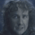 Two static show a person with curly hair against dark backgrounds, paired with text reading "Poem not very good. Feel slighted." on the right